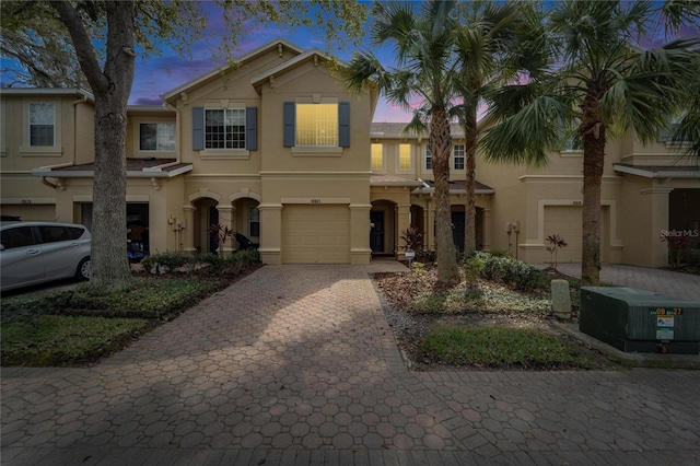 view of front of property featuring a garage