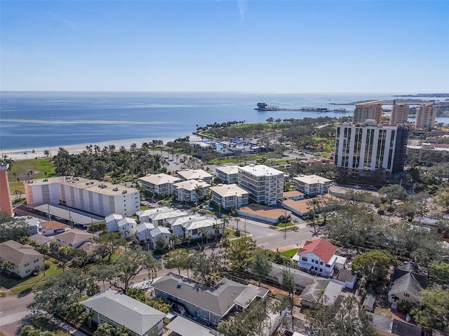 drone / aerial view featuring a water view and a city view