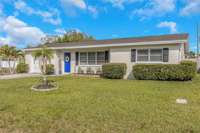 single story home featuring a front lawn