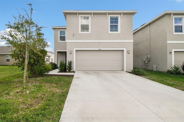 view of front of house featuring a garage and a front yard