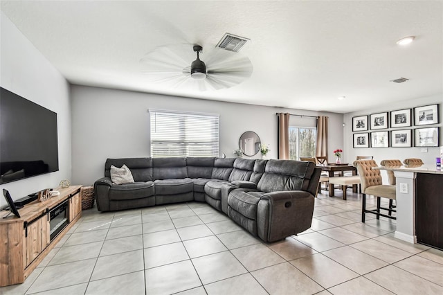 16126 Sunday Stroll Way, Odessa, FL 33556 - living room featuring light tile patterned flooring and a ceiling fan