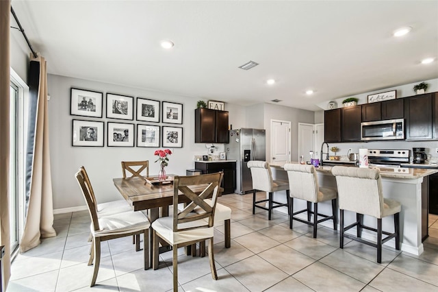 16126 Sunday Stroll Way, Odessa, FL 33556 - dining space featuring light tile patterned floors and recessed lighting