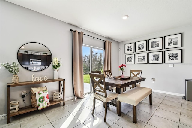 16126 Sunday Stroll Way, Odessa, FL 33556 - dining room featuring baseboards and light tile patterned floors