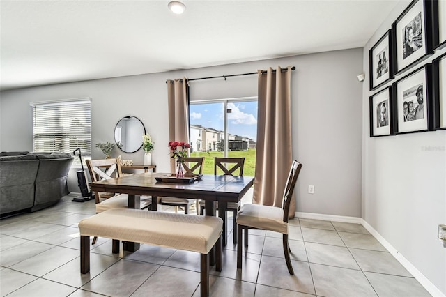 16126 Sunday Stroll Way, Odessa, FL 33556 - dining area with light tile patterned floors and baseboards