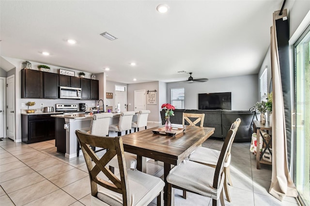 16126 Sunday Stroll Way, Odessa, FL 33556 - dining space featuring healthy amount of natural light, light tile patterned floors, recessed lighting, and a ceiling fan