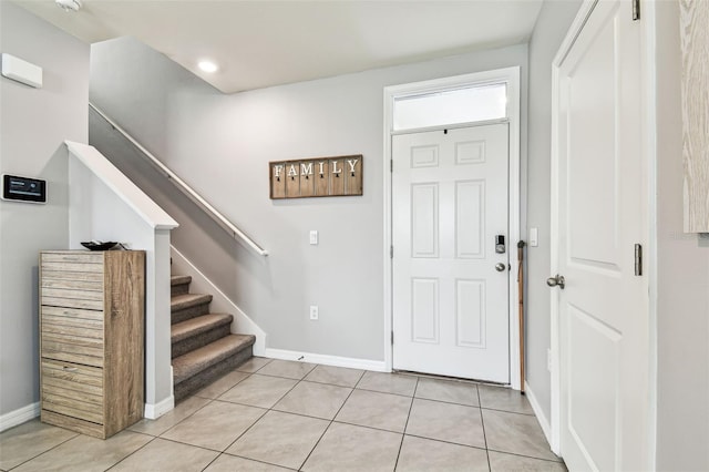 16126 Sunday Stroll Way, Odessa, FL 33556 - foyer entrance featuring stairs, light tile patterned floors, baseboards, and recessed lighting