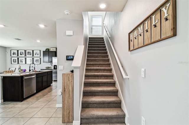 16126 Sunday Stroll Way, Odessa, FL 33556 - stairs with tile patterned floors, recessed lighting, and baseboards