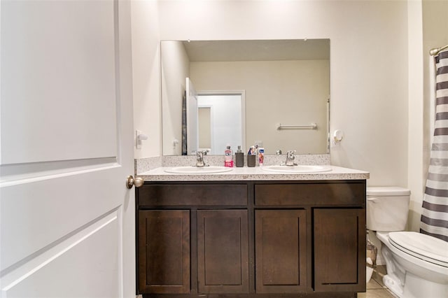 16126 Sunday Stroll Way, Odessa, FL 33556 - bathroom with toilet, double vanity, and tile patterned floors