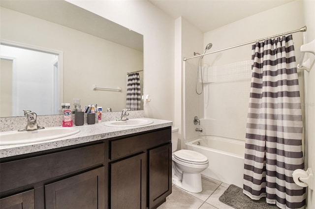 16126 Sunday Stroll Way, Odessa, FL 33556 - full bath featuring tile patterned floors, toilet, double vanity, and shower / bath combo with shower curtain