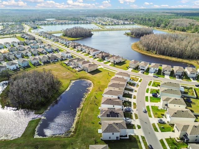 16126 Sunday Stroll Way, Odessa, FL 33556 - aerial view of residential area with a large body of water and a forest
