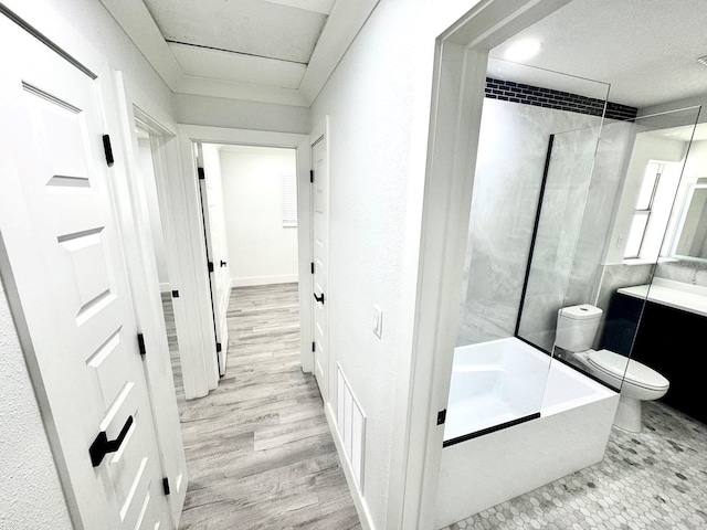 hallway featuring light wood finished floors