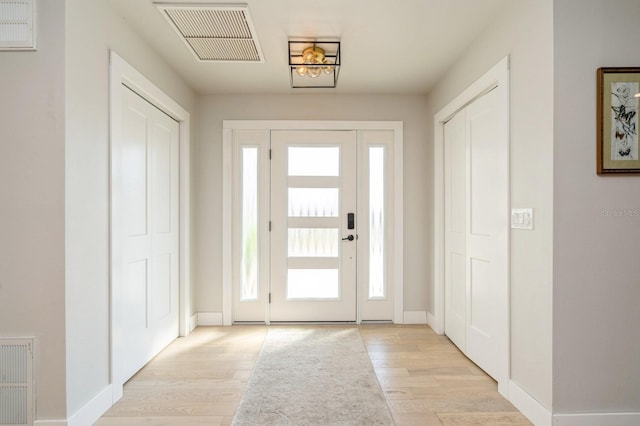 entryway with light wood-type flooring