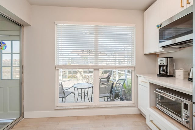 kitchen with white cabinetry