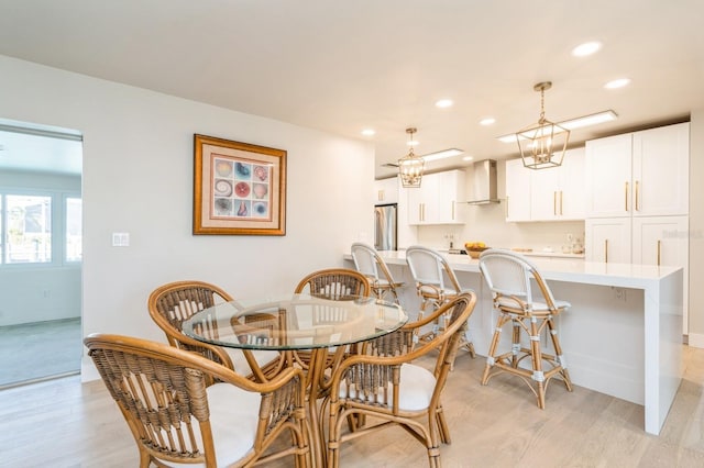 dining room with light hardwood / wood-style flooring