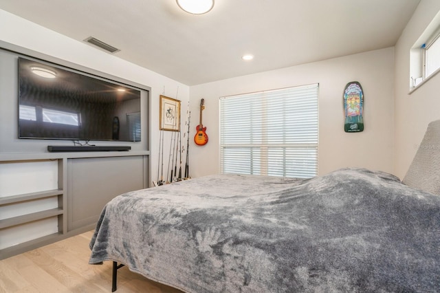 bedroom featuring light hardwood / wood-style floors