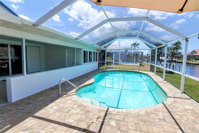 2821 Coral Way, Punta Gorda, FL 33950 - pool featuring a patio area, a lanai, and a water view