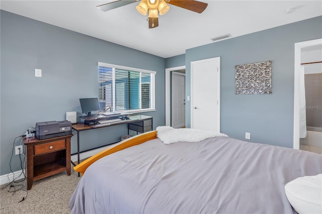 bedroom featuring ceiling fan, visible vents, and baseboards