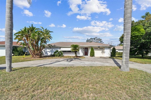 ranch-style house featuring a garage and a front yard