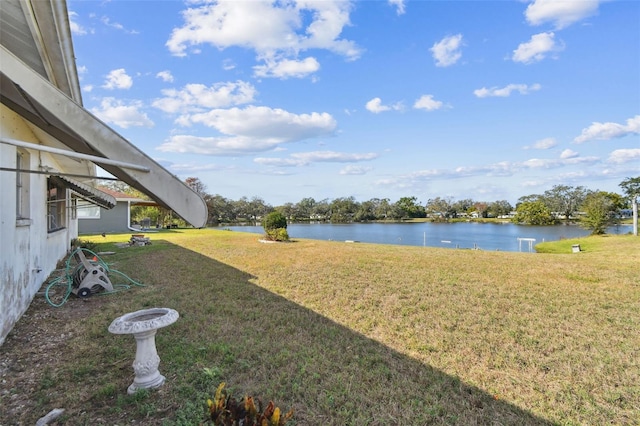 view of yard with a water view