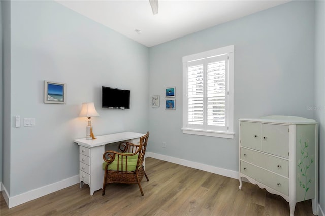 home office with light wood-type flooring