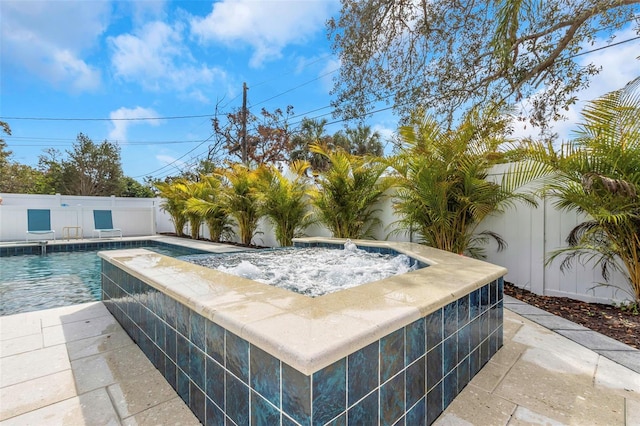 view of pool with pool water feature