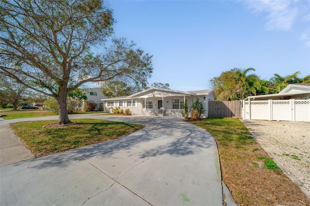 ranch-style home with covered porch