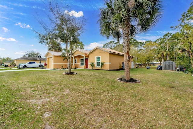 view of front of house with a storage shed and a front yard