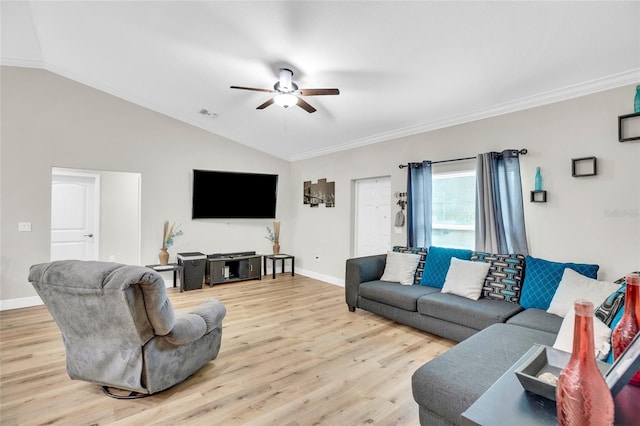 living room featuring lofted ceiling, hardwood / wood-style flooring, ornamental molding, and ceiling fan