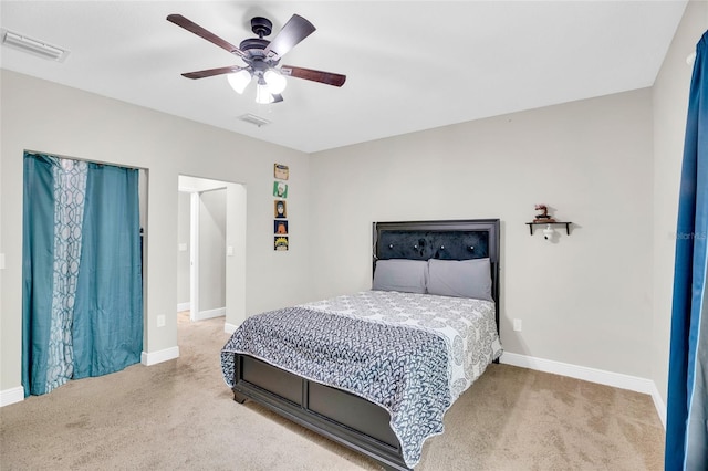 bedroom with ceiling fan and carpet flooring