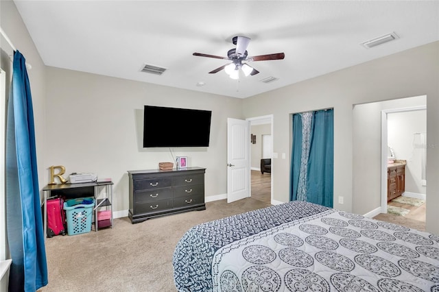 bedroom with light carpet and ceiling fan