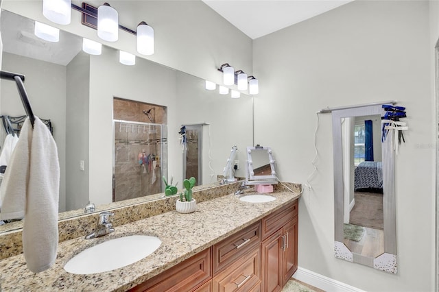 bathroom with vanity and an enclosed shower