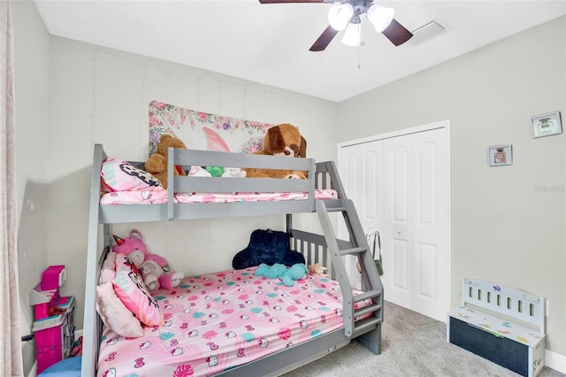 bedroom featuring ceiling fan, carpet floors, and a closet