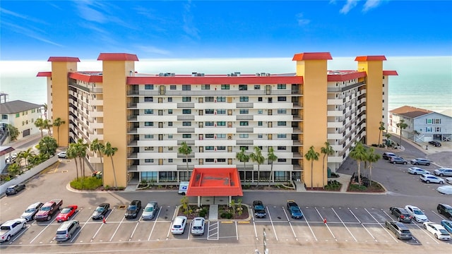 18304 Gulf Blvd Unit 217, Redington Shores, FL 33708 - view of apartment building / complex featuring a water view and uncovered parking