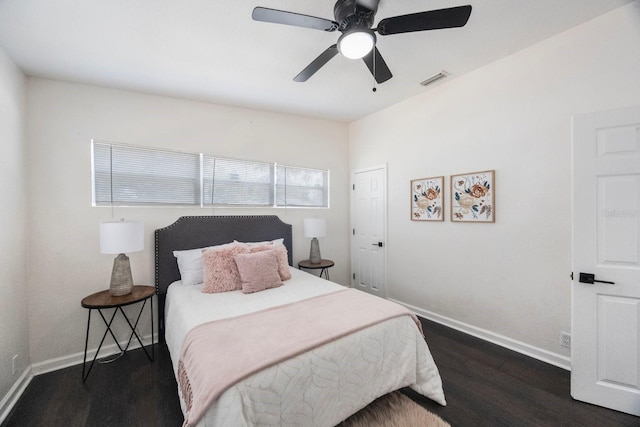 bedroom featuring ceiling fan and dark hardwood / wood-style flooring