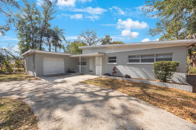 ranch-style home featuring a garage