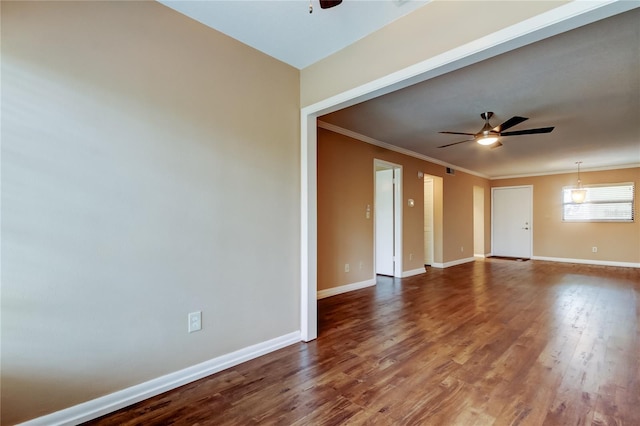 unfurnished room with hardwood / wood-style flooring, ornamental molding, and ceiling fan