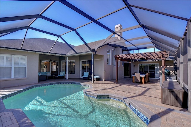 view of swimming pool featuring a patio, a lanai, a pergola, and ceiling fan