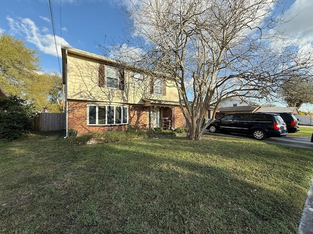 view of front of house with a front lawn