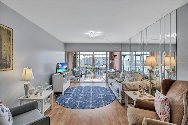 living room with light hardwood / wood-style floors