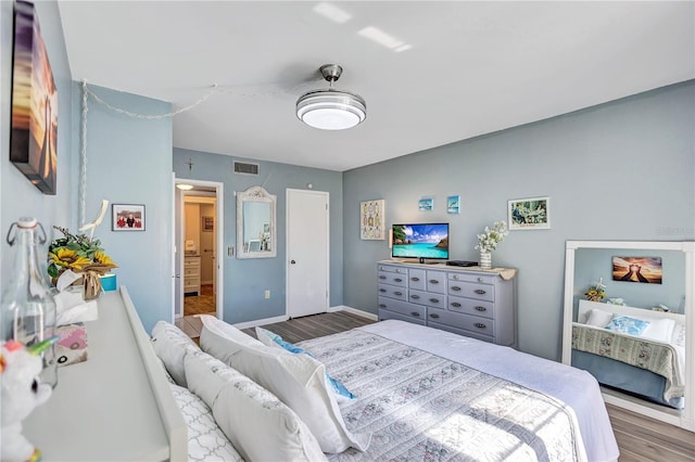 bedroom featuring hardwood / wood-style flooring