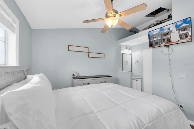 bedroom with lofted ceiling and ceiling fan