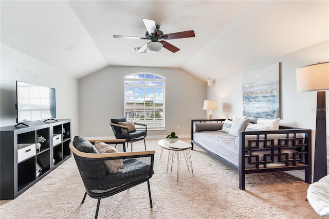 bedroom featuring carpet floors, lofted ceiling, and a ceiling fan