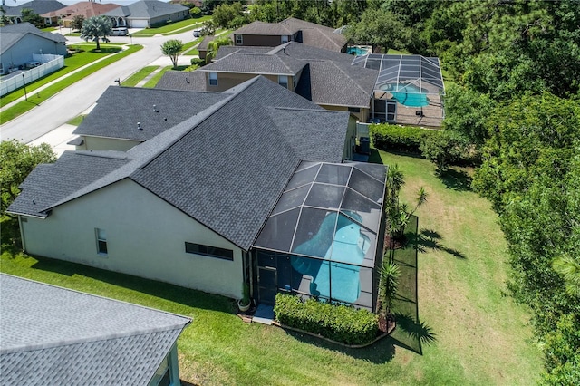 aerial view of residential area with a pool area