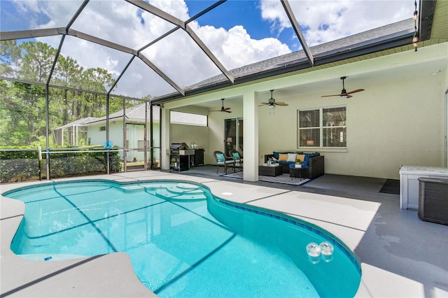 swimming pool featuring outdoor lounge area, a patio, ceiling fan, and a lanai