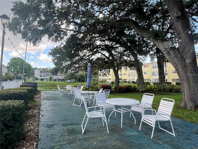 view of home's community featuring a patio