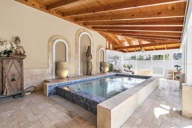 view of pool featuring a jacuzzi