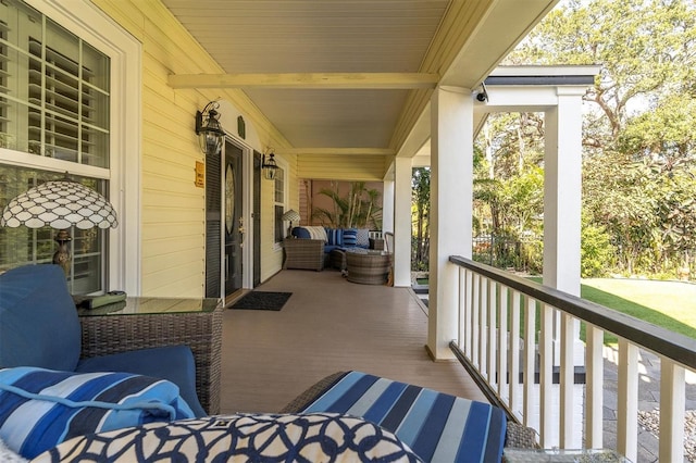 wooden terrace with covered porch