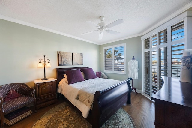 bedroom featuring a textured ceiling, ceiling fan, dark wood-style flooring, baseboards, and ornamental molding