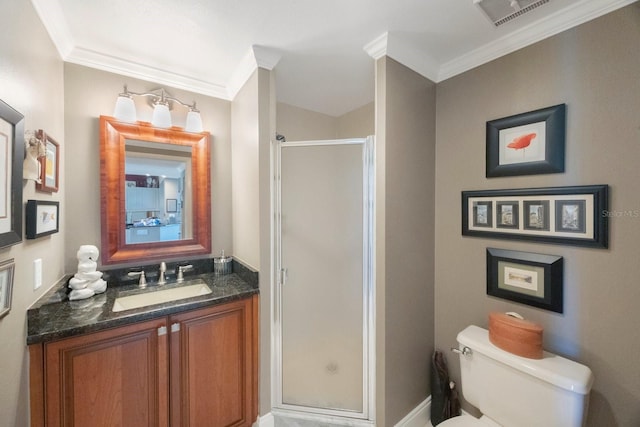 full bath featuring toilet, vanity, visible vents, a stall shower, and crown molding