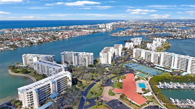 birds eye view of property featuring a view of city and a water view